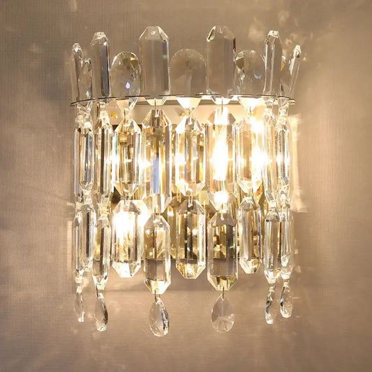 Luxury crystal wall lamp with faceted clear glass prisms and teardrop crystals for elegant bedroom decorbites crystal wall