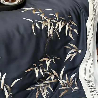 Luxury dark blue silk scarf with gold and white bamboo leaf embroidery complements 1000tc Egyptian cotton bedding set