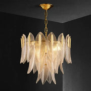 Luxury decorbites glass leaf gold chandelier featuring textured clear glass leaves and brass chain for living room lighting
