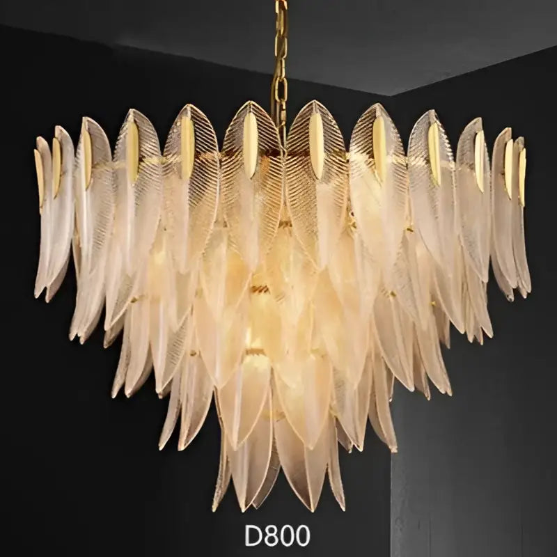 A luxury chandelier with translucent layered glass leaf petals in gold by decorbites for living room pendant light