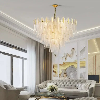 Elegant gold luxury chandelier with cascading translucent glass leaf elements by decorbites for living room pendant light