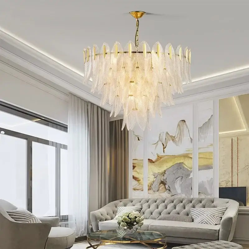 Elegant gold luxury chandelier with cascading translucent glass leaf elements by decorbites for living room pendant light