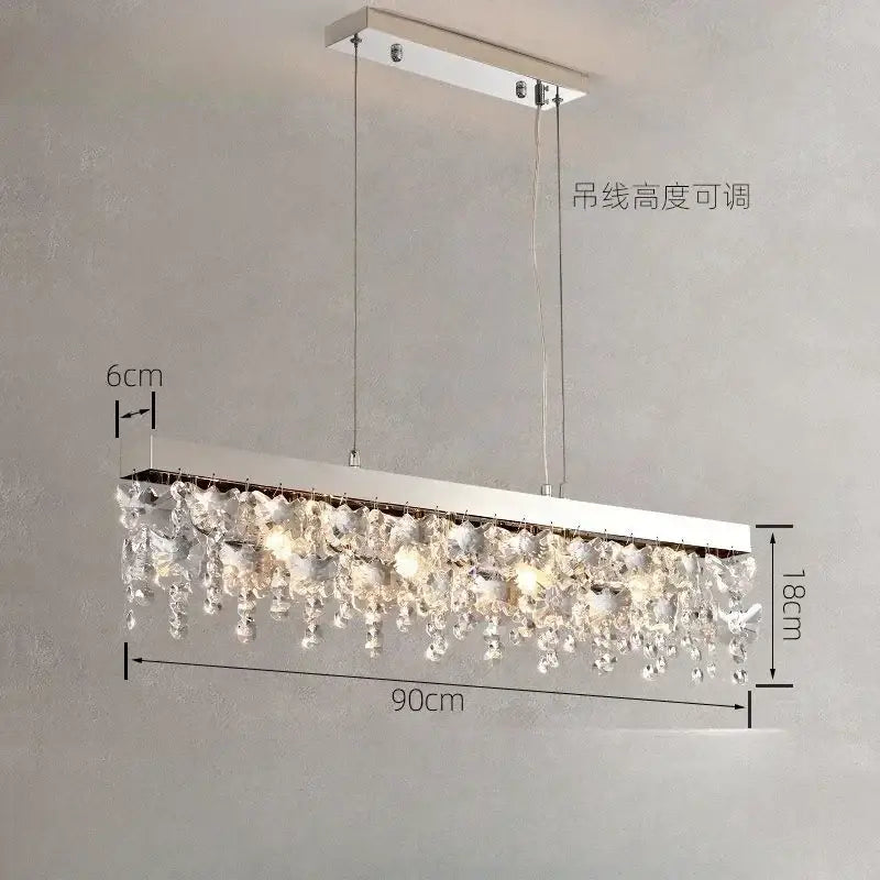 Luxury diamond crystal kitchen ceiling lamp with sleek chrome frame and cascading clear droplets from decorbites crystal kitchen decor
