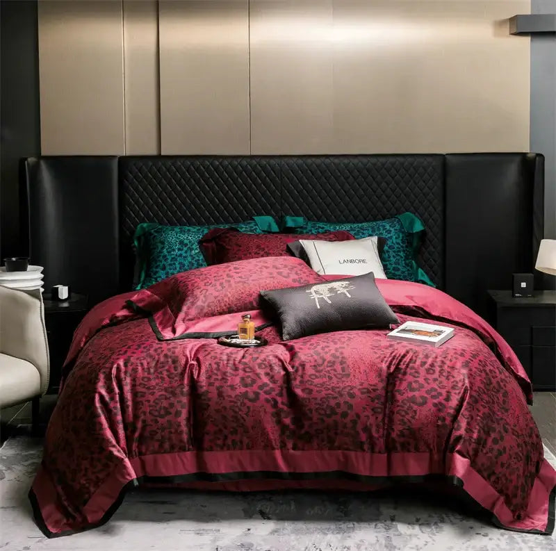 Luxury egyptian cotton leopard print bedding set with burgundy satin duvet cover and black trim in beige and brown bedroom