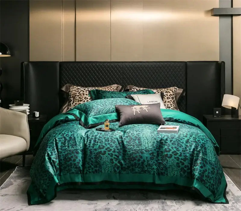 Emerald green leopard print satin bedding set with matching pillowcases and quilted black headboard in egyptian cotton leopard style