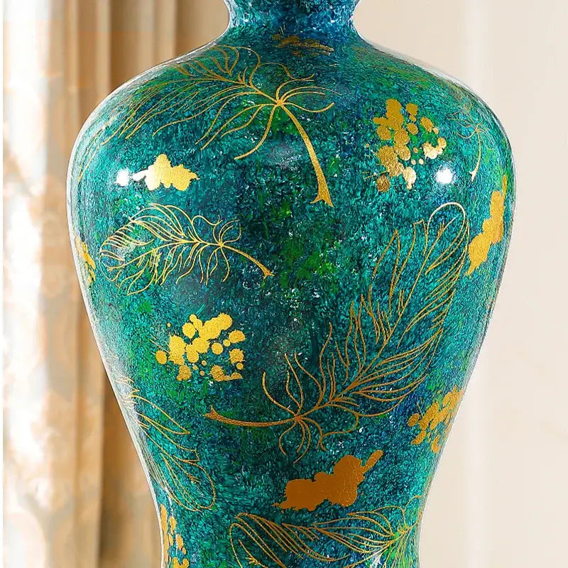 Luxury emerald queen green ceramic table lamp featuring a glossy teal vase with gold leaf feather and floral patterns