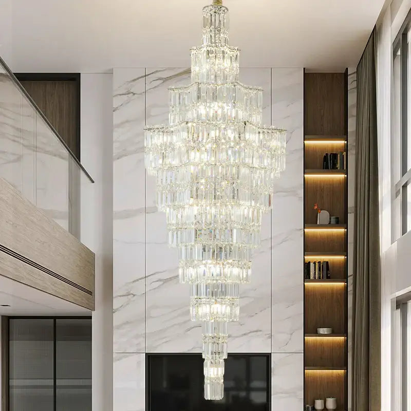 Luxury european crystal staircase chandelier with cascading faceted glass elements and polished metallic frame by decorbites crystal