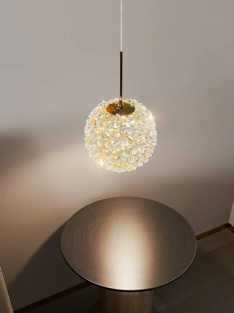 Luxury gold and amber crystal ball pendant light with a golden metal frame and decorbites crystal ball beads