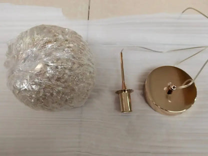 Luxury gold and amber crystal ball pendant light with clear globe and gold-toned metal hardware for bedroom decorbites pendant light