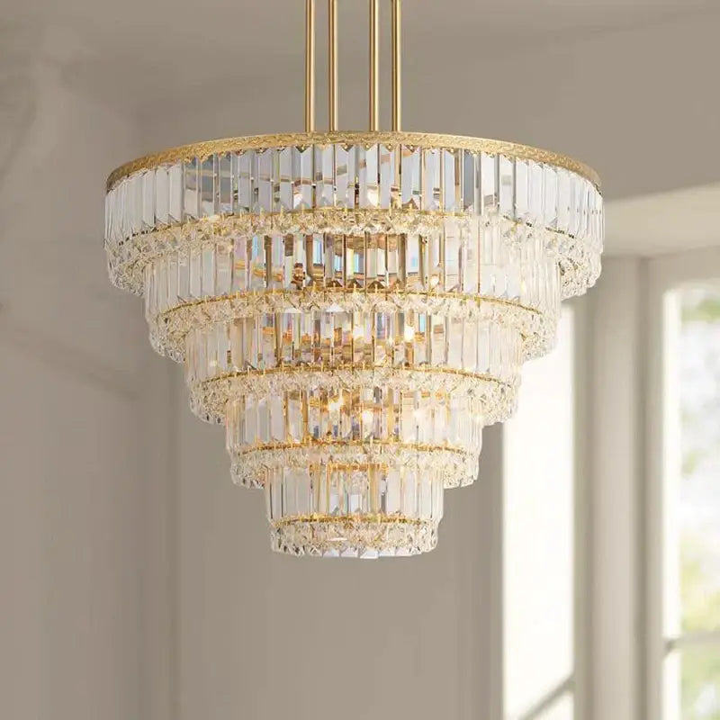 Luxury gold and amber crystal round pendant lights featuring multi-tiered crystal round pendant with gold-toned accents