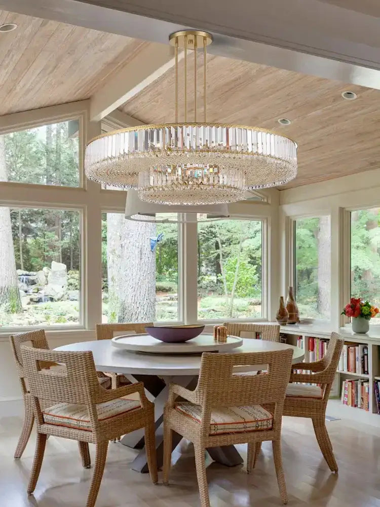 A luxury gold multi-tiered crystal round pendant light with amber prisms for living room decorbites crystal round design