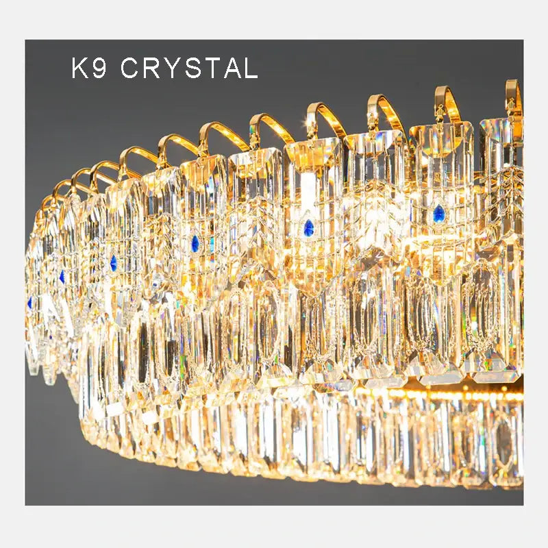 Luxury gold and blue decorbites crystal ceiling chandelier with cascading clear crystals for elegant dining room light