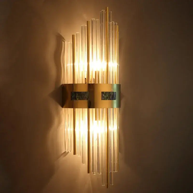 Luxury gold and blue crystal led wall lamp with gold-toned sconce and dark green marble for dining room decorbites crystal led