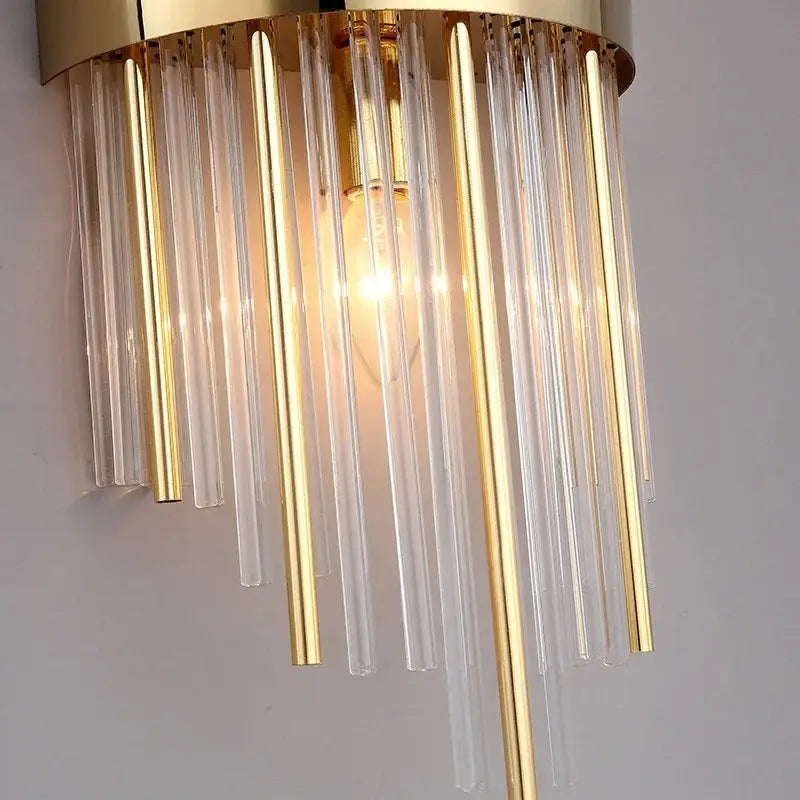 Luxury gold and blue decorbites crystal led wall lamp with clear glass prisms and warm glowing bulb for dining room decor