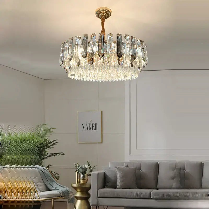 Luxury gold and bronze crystal modern pendant light featuring a cascading clear faceted glass prism design for dining room decorbites crystal modern pendant