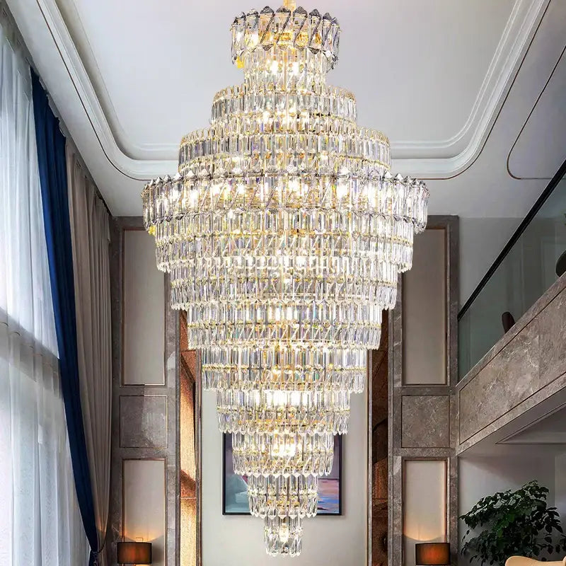 Luxury gold and clear crystal chandelier with cascading faceted crystals and warm lighting for living room staircase decorbites crystal chandelier