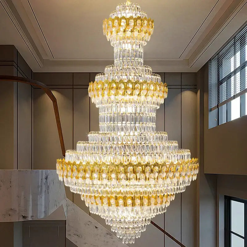 Luxury gold and clear crystal chandelier with multi-tiered prisms by decorbites deluxe for elegant living room decor