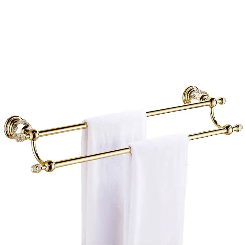 Luxury gold and crystal double towel rack bath hardware with two white towels for elegant bathroom accessories