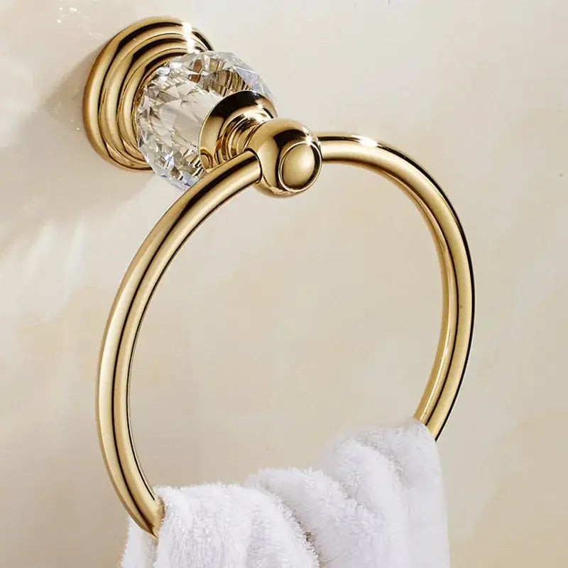 Gold-toned towel ring with faceted crystal accent part of a luxury gold and crystal bath hardware set bathroom accessory