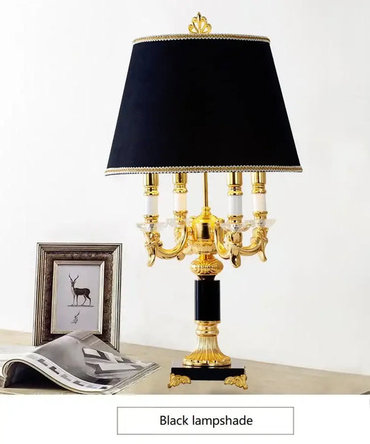 Elegant table lamp with black velvet crystal lampshade gold-trimmed edges on ornate golden base for black crystal bedroom decorbites