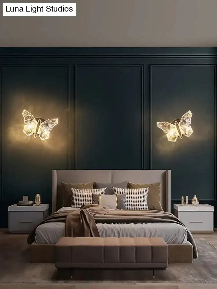 Luxury gold butterfly wall lamp featuring crystalline translucent design for elegant bedroom lighting with butterfly wall lamp appeal