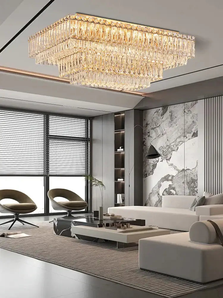 Luxury gold and clear decorbites crystal round ceiling lamp with faceted glass tiers emitting warm golden glow