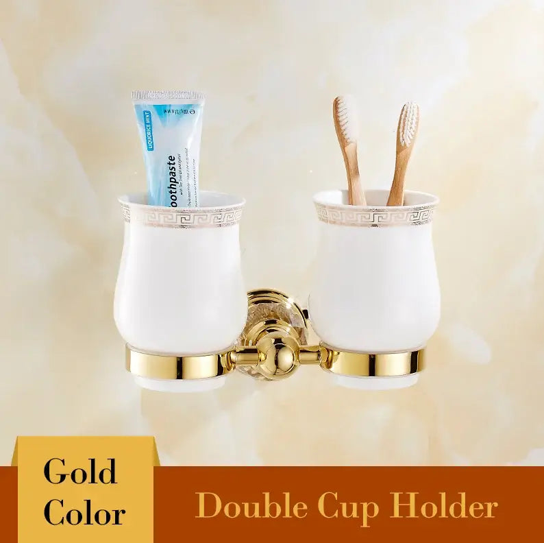 Luxury gold crystal bathroom set double cup holder with white ceramic cups and greek key pattern decorbites brass design