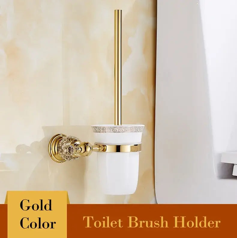Luxury gold and crystal bathroom set with a gold toilet brush holder ceramic cup and decorbites brass bracket