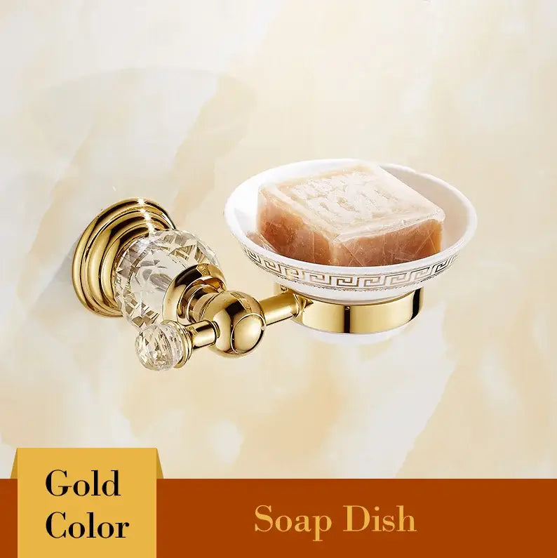 Gold-colored soap dish with crystal knob and greek key pattern rim from luxury decorbites brass crystal bathroom set