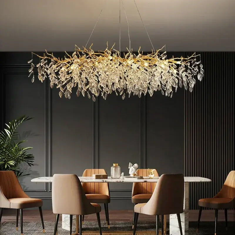 Luxury gold crystal branch led pendant chandelier with leaf-shaped design hanging above dining table decorbites crystal branch