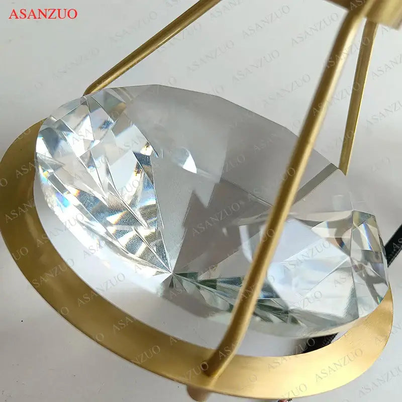Luxury gold crystal diamond led wall sconce with clear faceted crystal diamond and gold metal frame for bedroom lighting