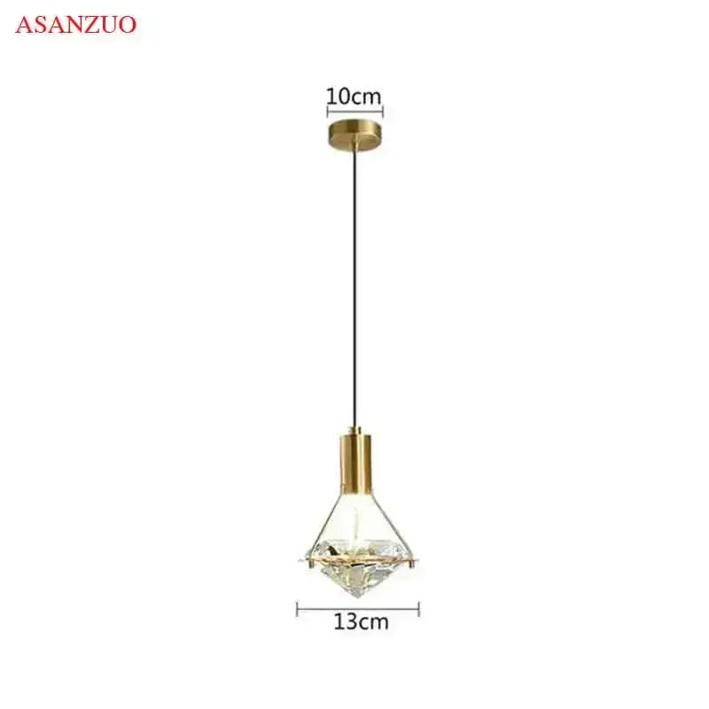 Luxury gold crystal diamond led wall sconce with a gold finish, clear crystal centerpiece, and black cord for bedroom decorbites lighting