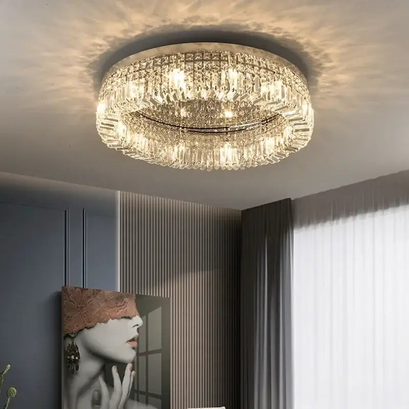 Luxury gold crystal glass round ceiling light with multiple tiers of decorbites crystal glass emitting warm light