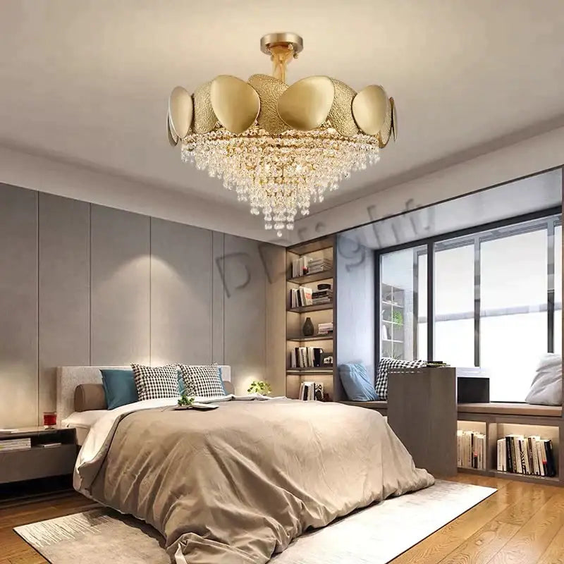 Gold-toned led ceiling chandelier with modern petal design and cascading crystal luxury tassels by decorbites