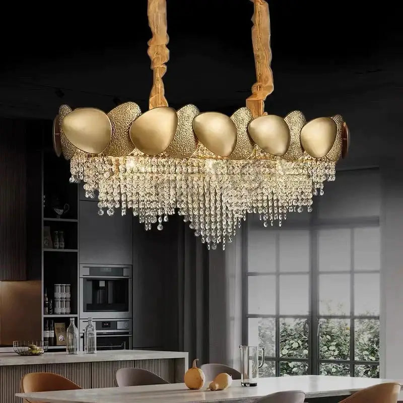 Gold-toned DecorBites™ Lizzie led ceiling chandelier with sculptural ovals and cascading crystal luxury tassels