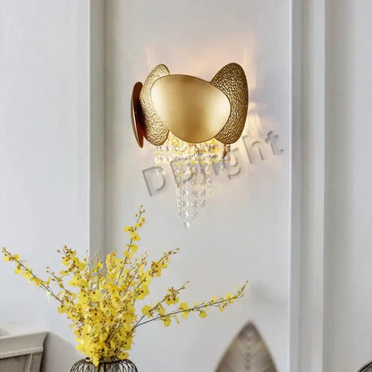 Gold-toned wall sconce with textured egg-shaped metal arms and crystal beads from DecorBites™ led ceiling chandelier