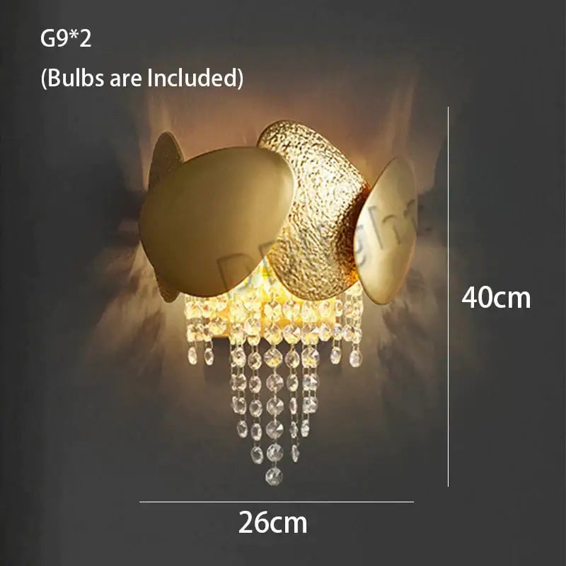 Gold-toned wall sconce with textured egg-shaped design and crystal tassels for led ceiling chandelier decorbites lizzie