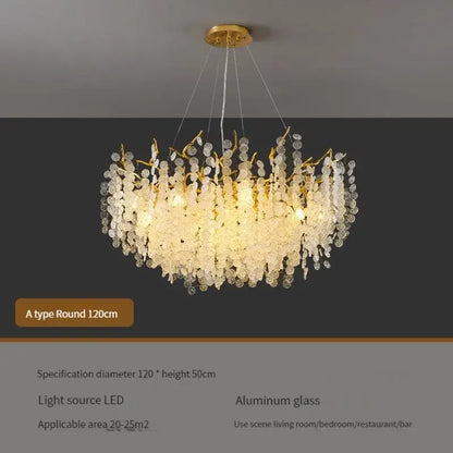 Luxury gold crystal led chandelier with cascading clear glass orbs and leaf-like metal accents by decorbites crystal led