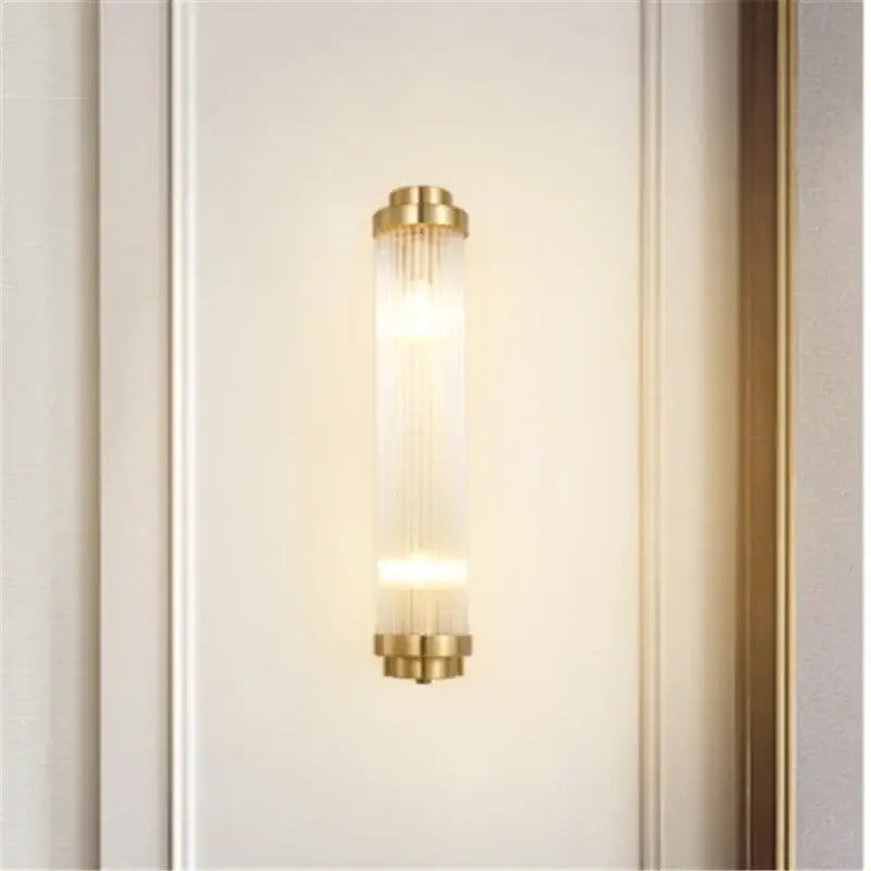 Luxury gold crystal led wall sconce with cylindrical glass prism body and warm light for bedroom led wall lighting