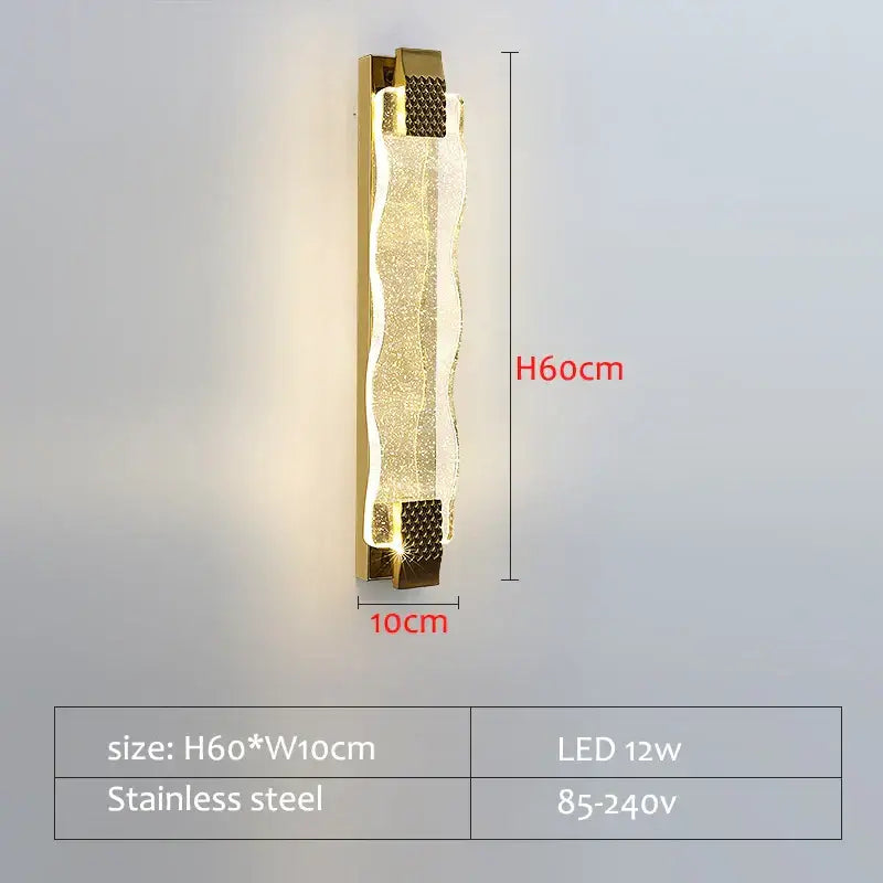Gold-toned decorbites crystal led wall sconce with textured wavy glass panel and stainless steel frame for living room decor