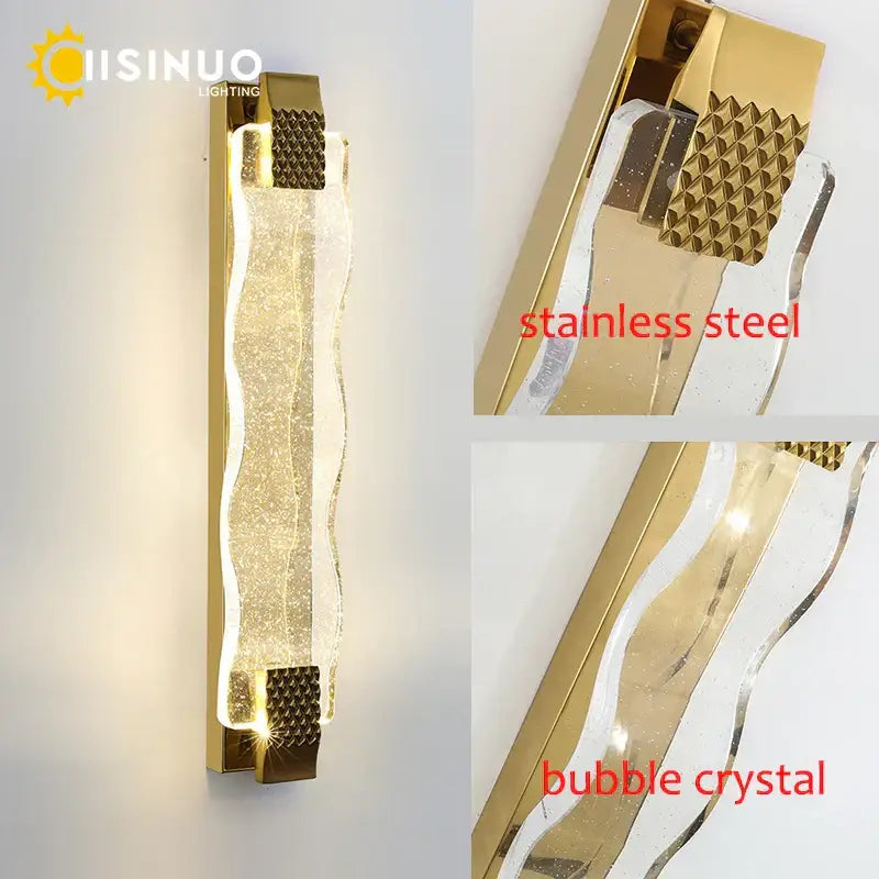 Luxury gold crystal led wall sconce with sleek wavy design, bubble crystal, and textured stainless steel decorbites crystal led