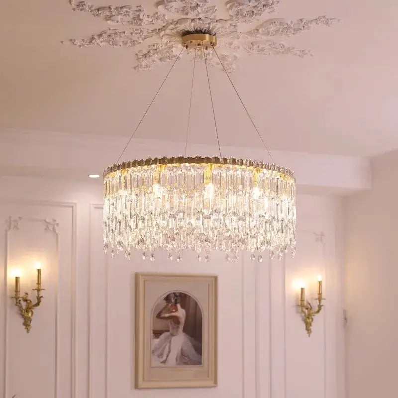 Luxury gold crystal pendant chandelier with a gold-toned frame and hanging glass prisms for living room decorbites crystal pendant