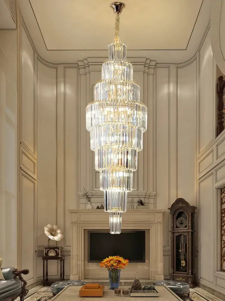 Luxury gold crystal pendant chandelier with cascading cylindrical prisms by decorbites for hotel lobby decor