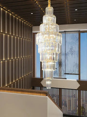 Luxury gold crystal pendant chandelier with cascading cylindrical glass tiers, ideal for hotel lobby decorbites crystal pendant