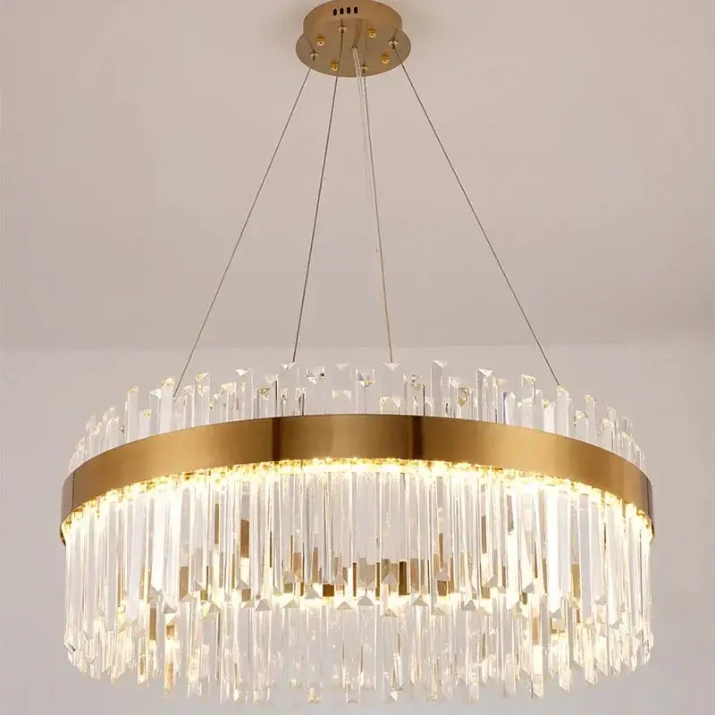 Luxury gold crystal pendant chandelier featuring a circular gold-toned frame with clear crystal prisms for living room decorbites crystal pendant lighting