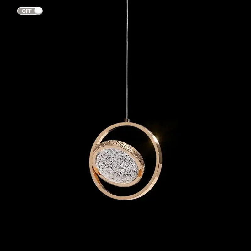 A modern rose gold pendant light featuring a crystal ring pendant decorbites perfect for luxury bedroom lighting