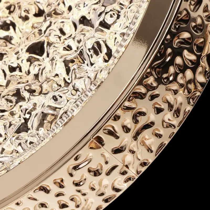 Gold-toned decorbites crystal ring pendant light tray with intricate embossed patterns for luxury bedroom lighting decor