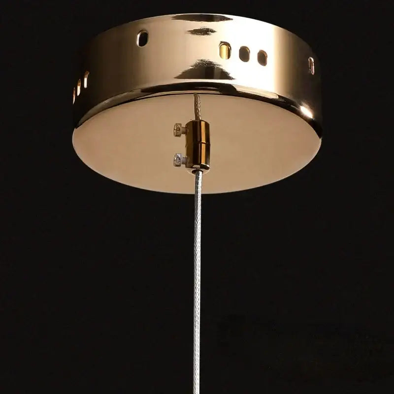 Luxury gold crystal ring pendant light with brass finish and braided cable for bedroom decorbites crystal ring lighting