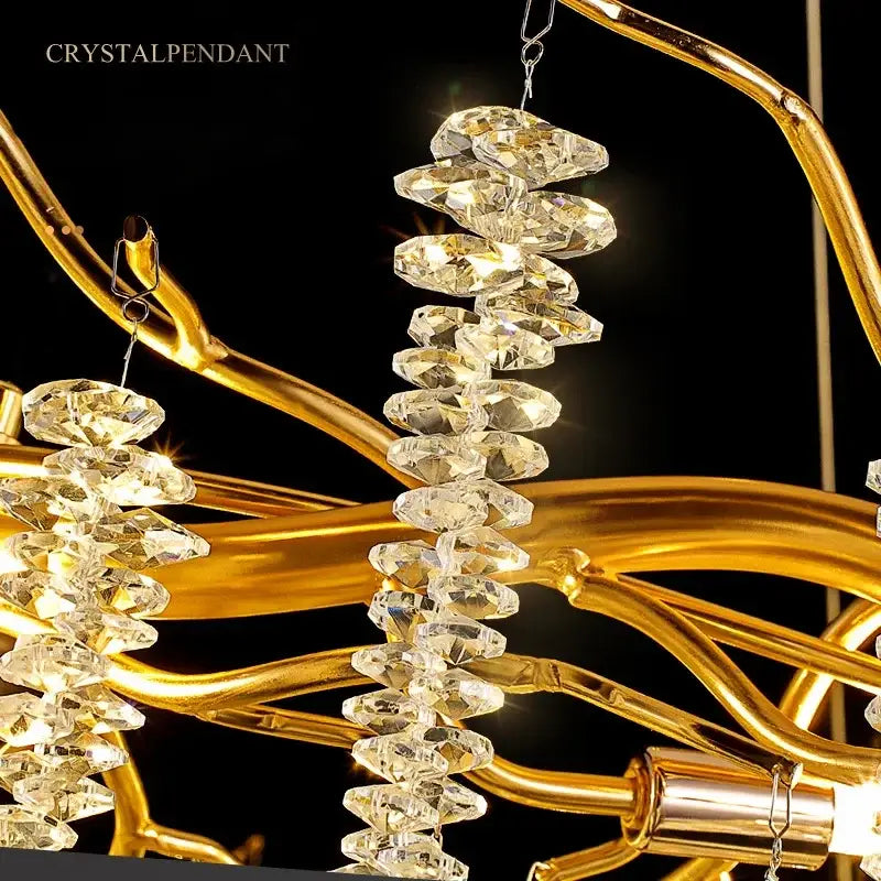 Luxury gold crystal tassel chandelier with clear faceted gemstones on an elegant gold-toned tree branch light decorbites crystal tassel