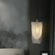 Luxury gold crystal tassel pendant with golden metal fixture and cascading clear crystal beads for dining room lighting